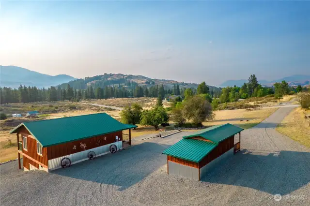 Cabin and outbuilding. Gravel driveway for low maintenance and plenty of parking.