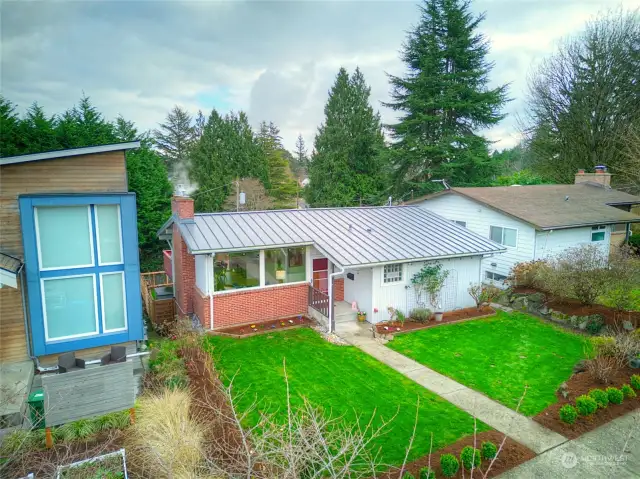 Fresh landscaping welcomes you home to this bigger-than-it-seems daylight rambler.