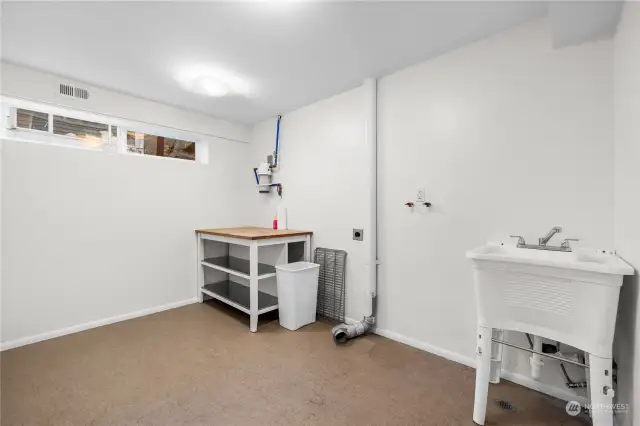 This oversized laundry room offers plenty of space for storage.