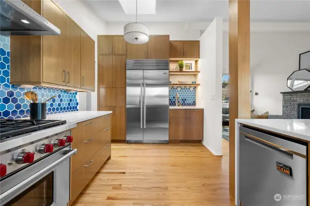 Don't miss the wet bar with open display shelving!