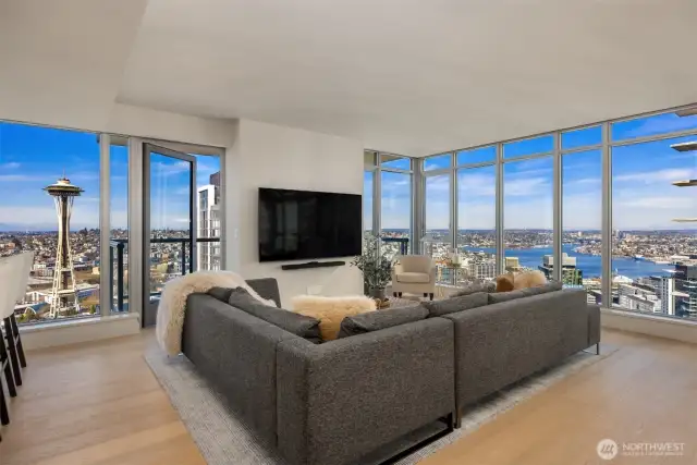 Luxury 38th Floor Condo with Water, Mountain, and City Views