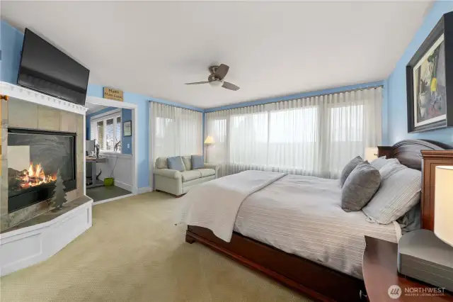 Primary bedroom with gas fireplace.