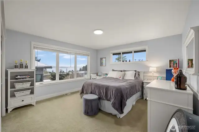 Upstairs bedroom with views of Lake Washington and the Olympic Mountains.
