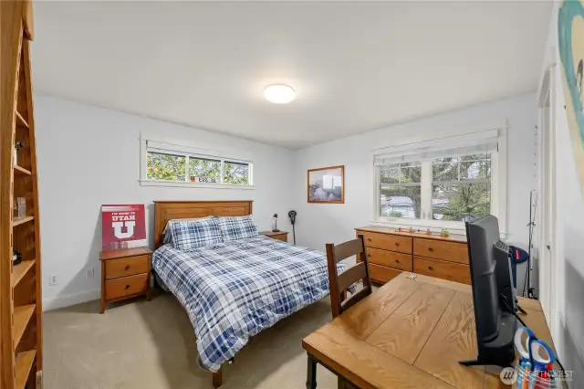 Additional upstairs bedroom with walk-in closet.