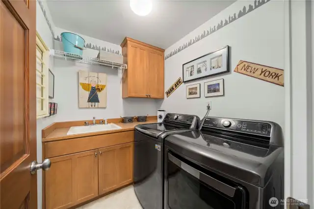 Upstairs laundry room.  Washer & dryer included in the sale of the home.