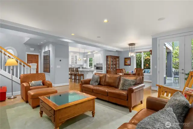 Living room flows into dining and kitchen.
