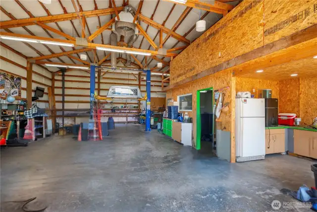 Check out the car lift!  This is a mechanics dream shop