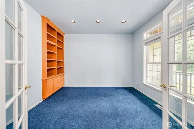 To the right of the foyer is the living room/first floor office.