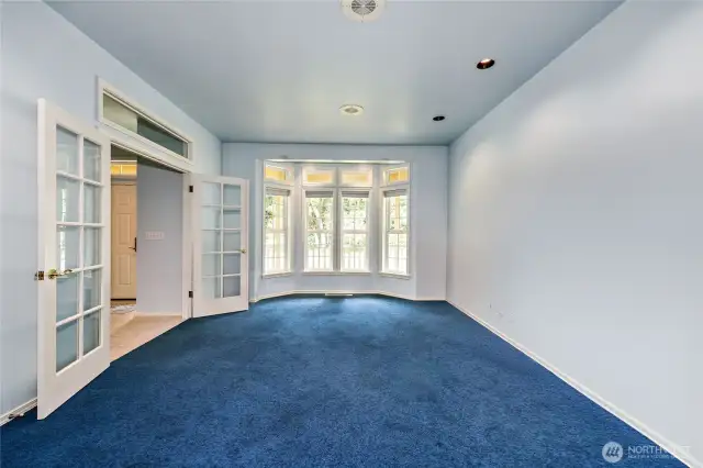 To the left of the foyer is the dining room.