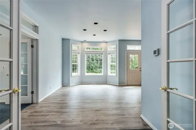 Coming out of the dining room into the eat-in kitchen area.
