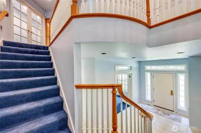 Going up the stairs from the kitchen area.