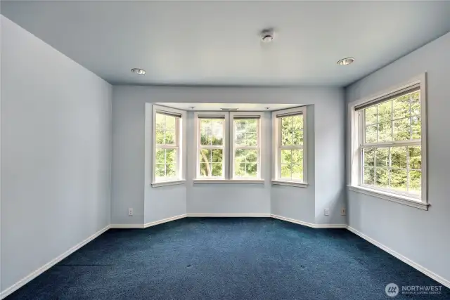 Second of three additional bedrooms.