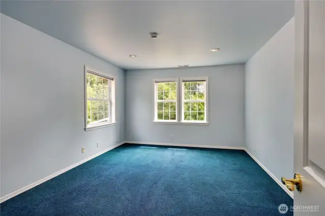 Third of three additional bedrooms.