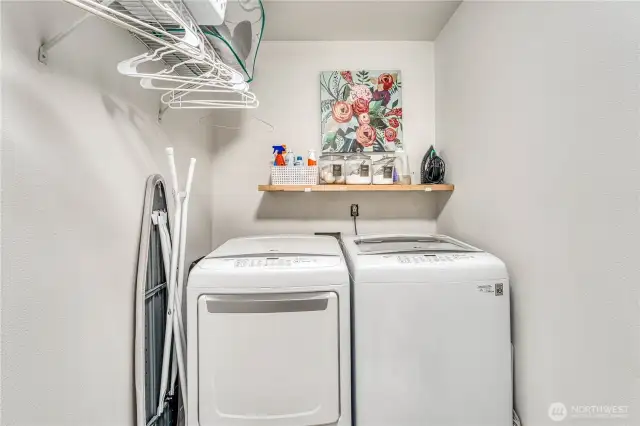 Laundry room with extra hanging space.
