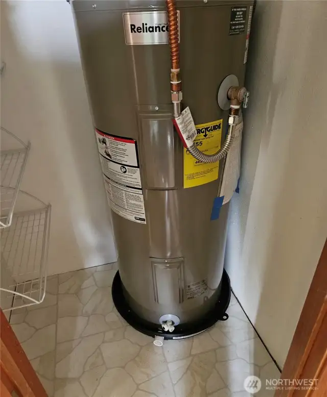 Hot water tank in hall closet