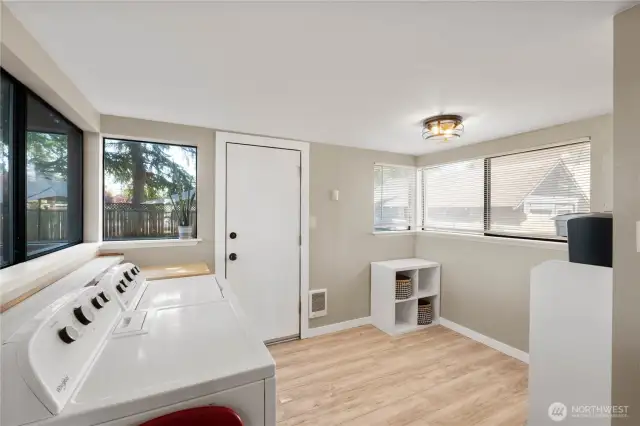 back room can be used as mud room, dining space or office area.