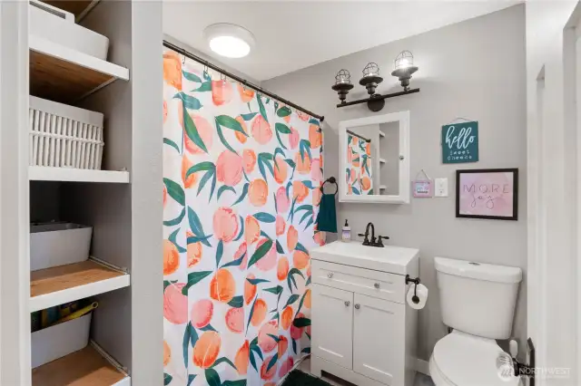 fully updated bathroom with shower and tub