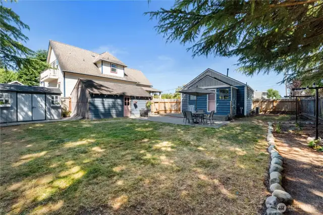 large grass area and garden area