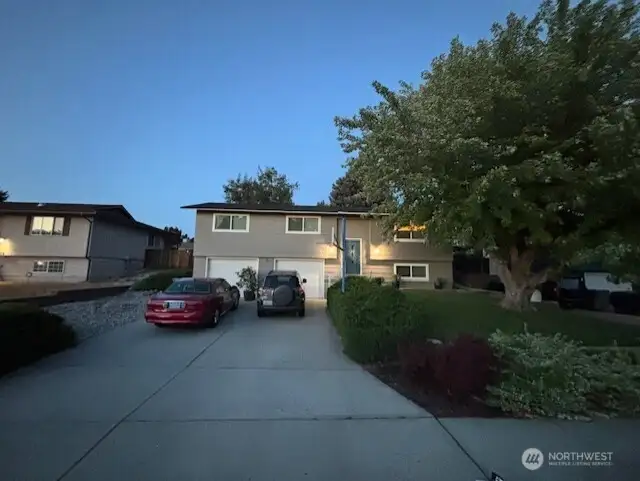front view of home from street.  Well manicured and taken care of