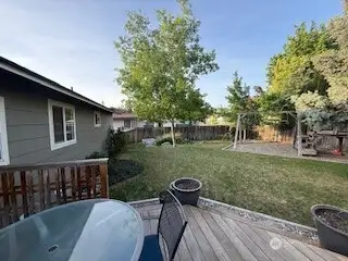 cozy backyard with great shade and entertaining space