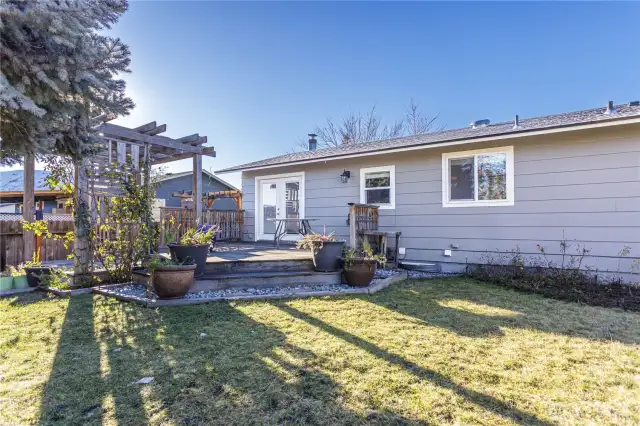 backyard facing the house/west