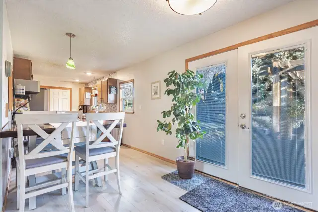 eating area facing backyard and back deck