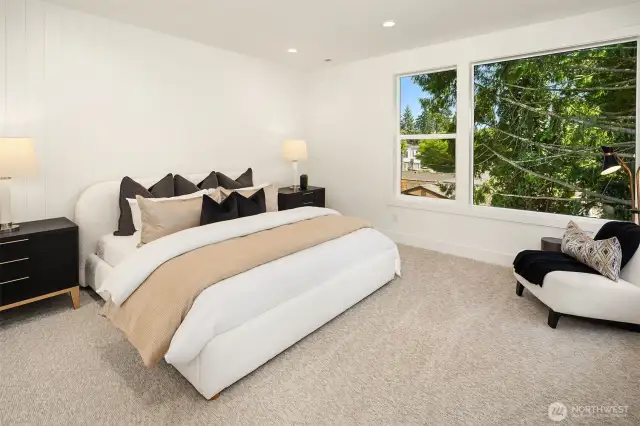 Designer primary suite with five-piece bath & heated floors