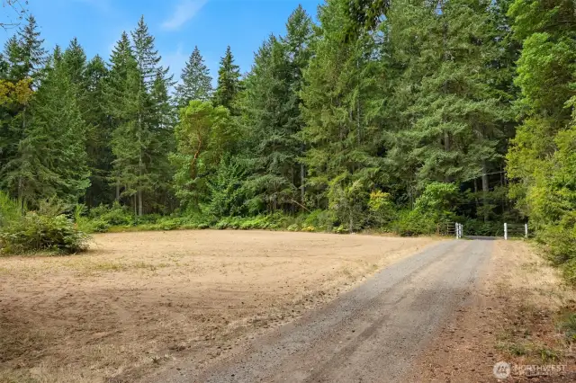 Long driveway leads you to the house set approximately 1,000 ft back from the hwy