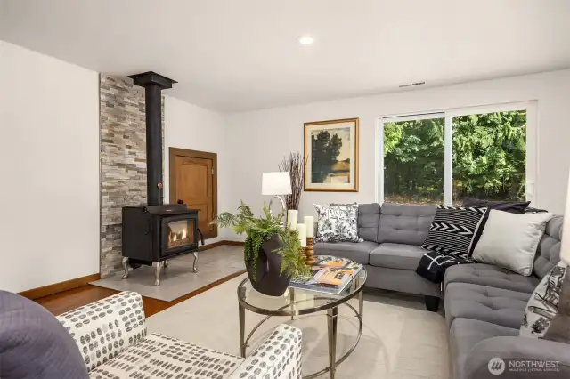 Cozy wood burning stove can heat the whole house.