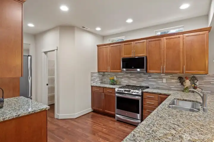 All new stainless steel appliances, Granite slab countertops