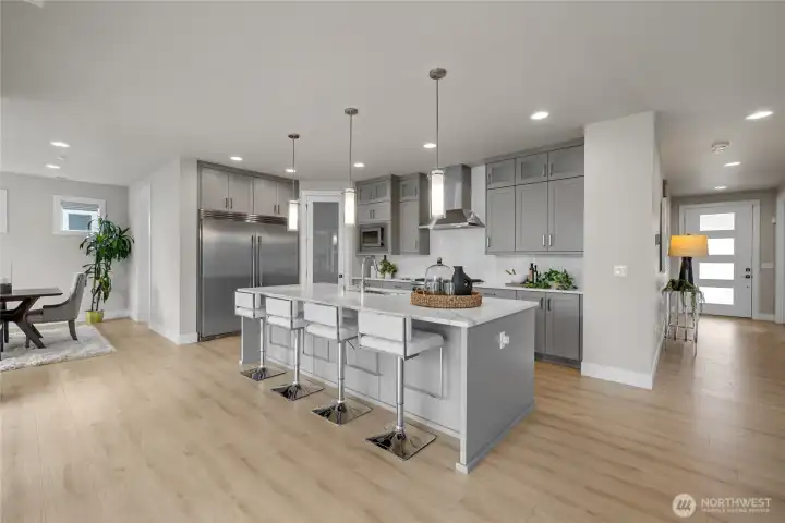 Massive quartz island with deep sink – ideal for entertaining.