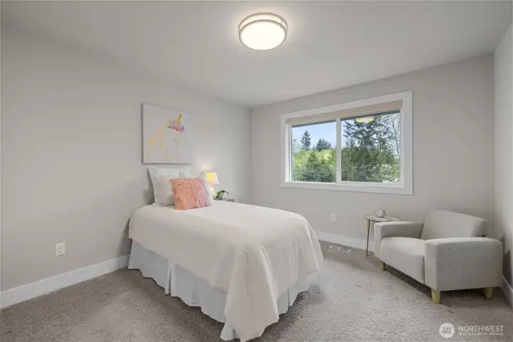 Spacious second bedroom upstairs.