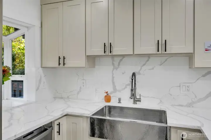 A sink big enough to let the dirty dishes sit before loading the dishwasher.