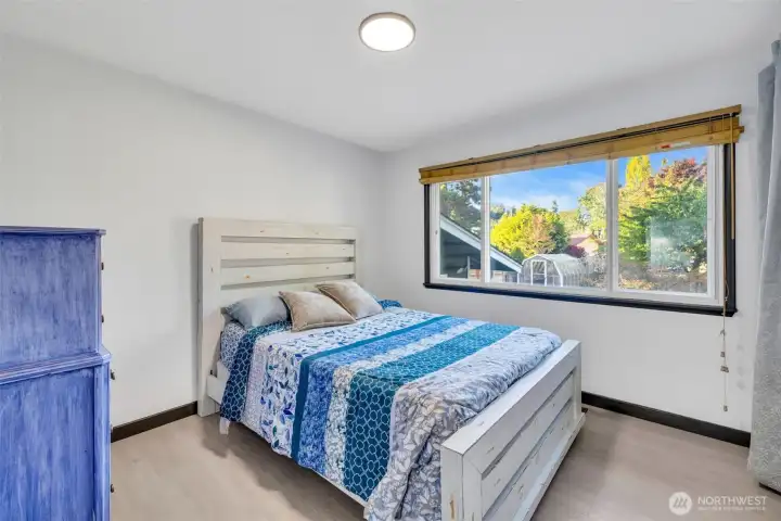 Upstairs bdrm #2 - the blinds you open to view the magical backyard.