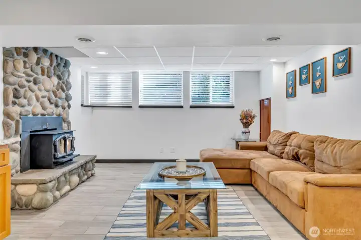 A fireplace downstairs to keep you warm while you wait your turn for the bathroom.