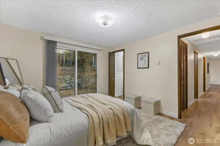 Primary bedroom with attached bathroom