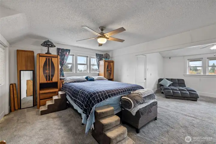 Primary bedroom with extra sitting area plenty room for all your needs