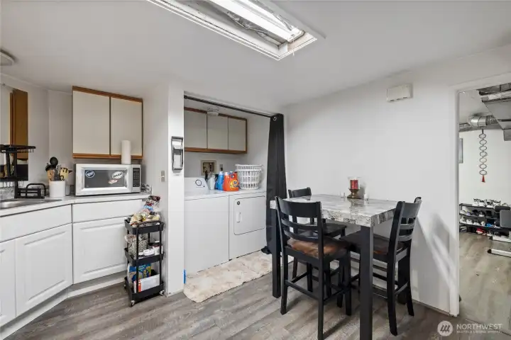 basement kitchen and washer and dryer that stay