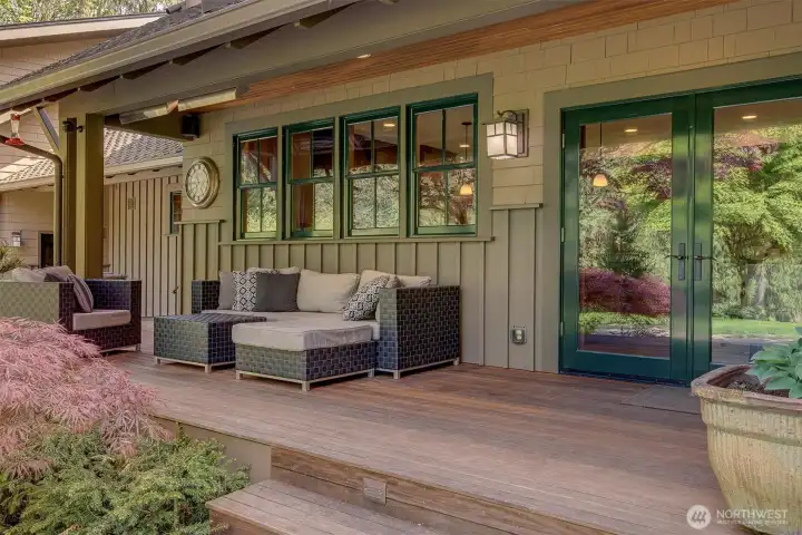 A covered back patio with heat lamps allows you to enjoy the great outdoors year-round