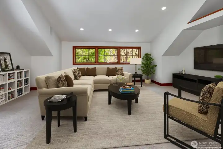 Upstairs bonus room over the garage. Generous spaces for media, exercise or entertaining