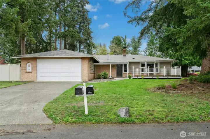 Front of the house- lots of curb appeal! 2 car garage and front deck.