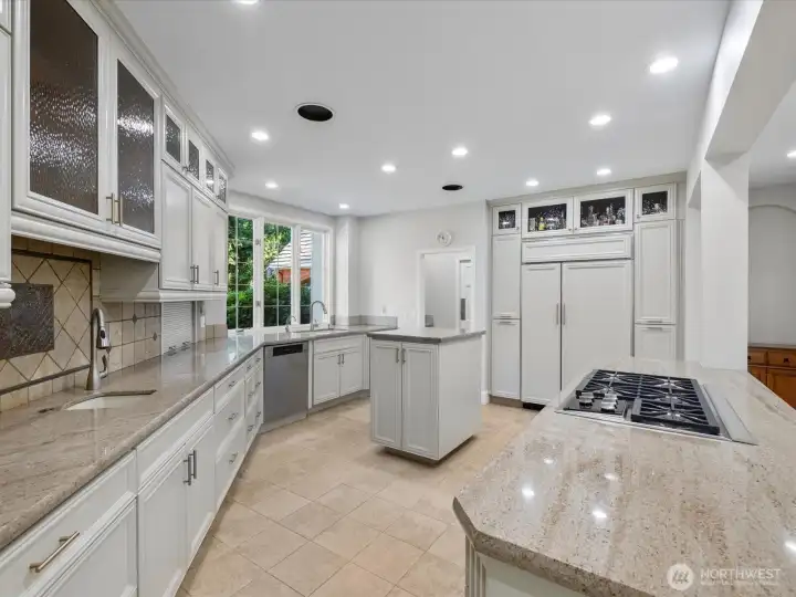 Chef's Dream Kitchen.  Butler's pantry to the left of fridge.  Wolf stove top.  Sub zero fridge.  Freshly painted.
