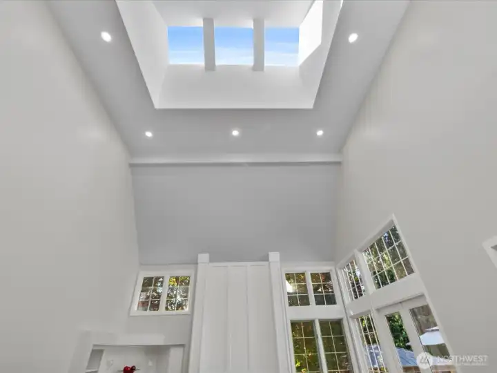 Dramatically HUGE vaulted ceiling with skylights.  These south facing windows are new with updated UV protection.