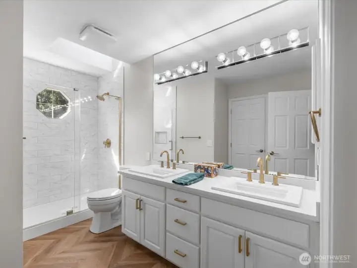 Brand new upstairs bathroom.  Absolutely stunning.  This bathroom is connected to the hallway and bedroom #2