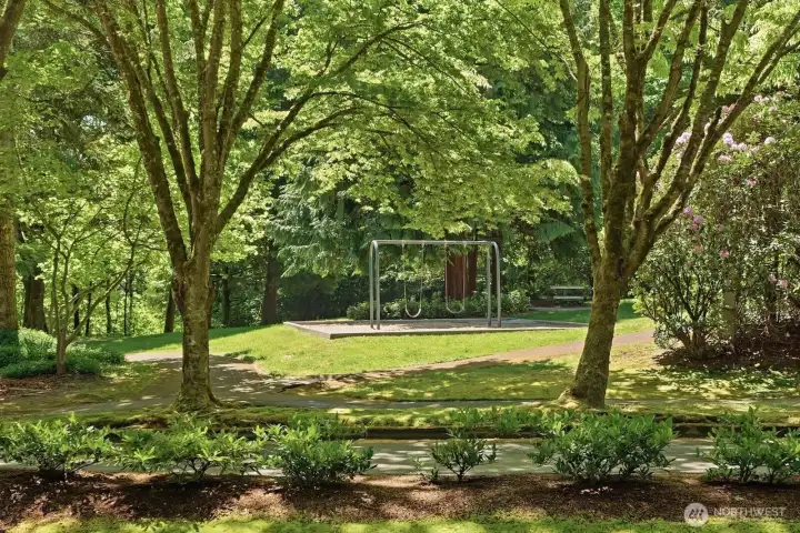 A peaceful view of Nickel Creek Park, where shaded trails, open green space, and play areas create a beautiful natural escape just moments from home.