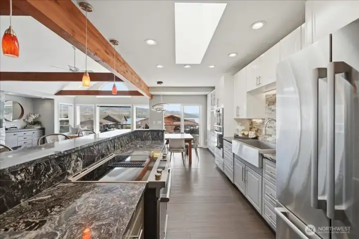 Stainless appliances, marbled counters, farmhouse sink
