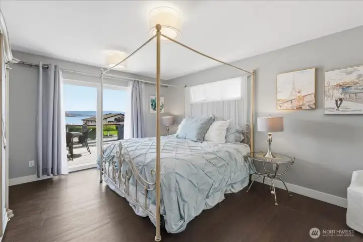 Primary suite on main with views towards the lake