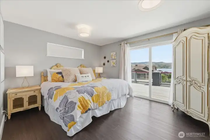 Spacious bedroom on main with lake view