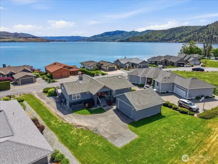 Plenty of off-street parking and grassy areas to gather + deatched garage to store your toys