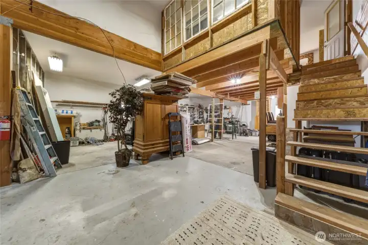248 Attached Shop with unfinished upstairs room which provides access to additional storage